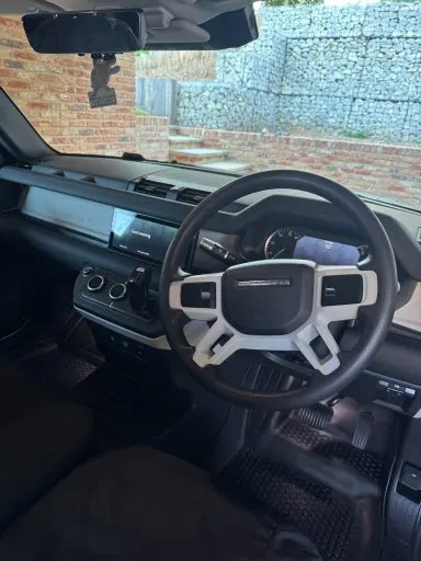Land Rover Defender steering wheel and dashboard after an interior detail