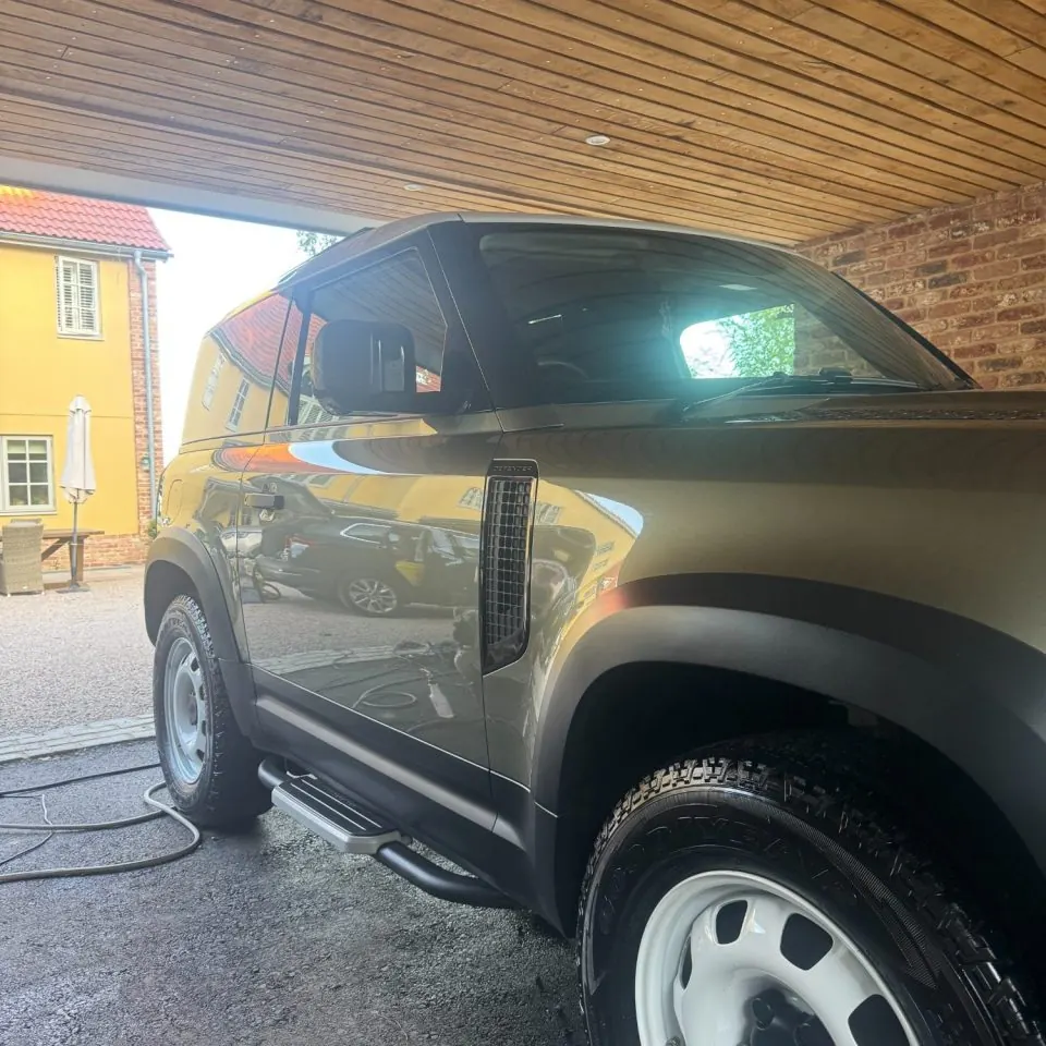 Vehicle being detailed on a customer driveway in Kent by Ash's Vehicle Valet and Detailing